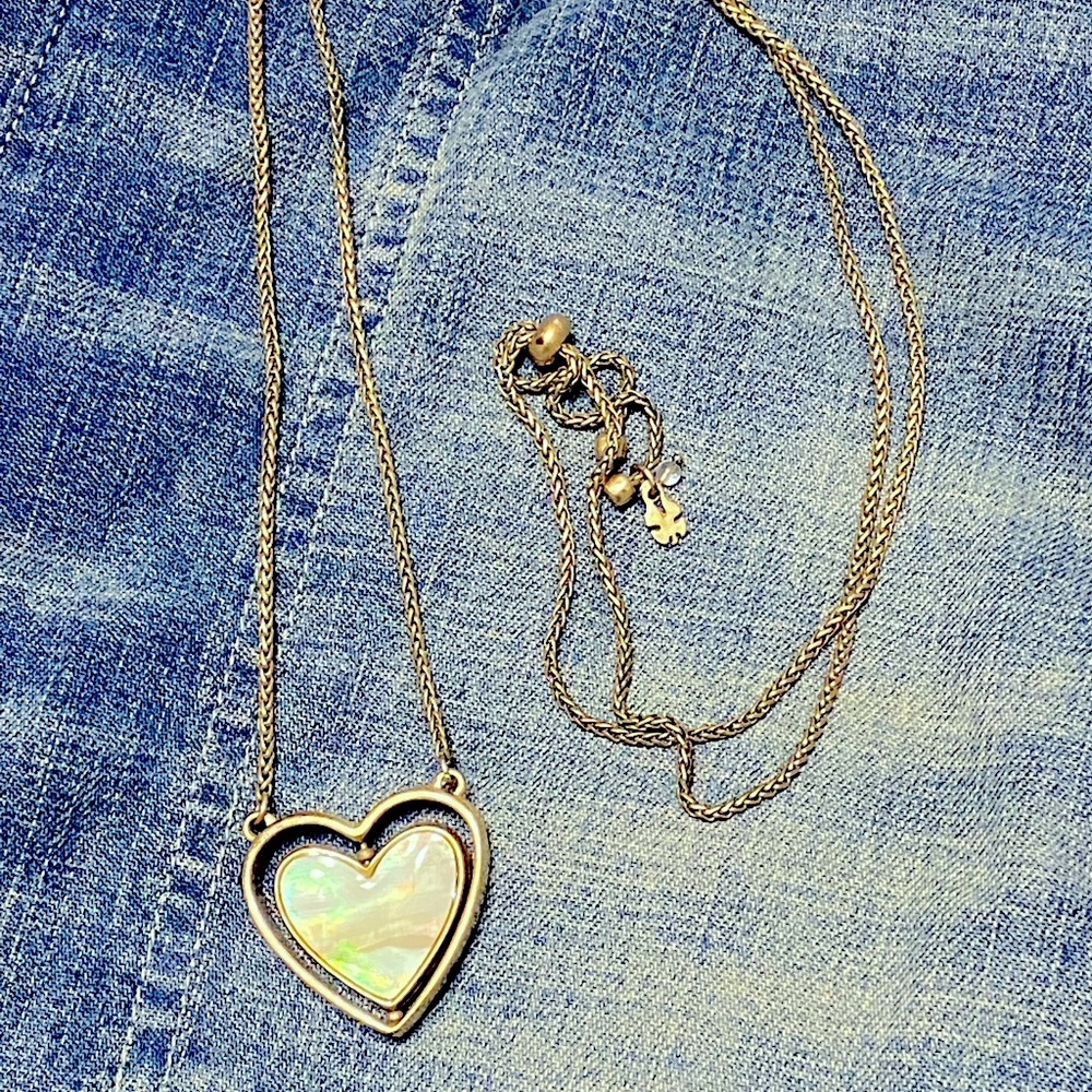 Fossil Spinning Heart Mother of Pearl Necklace